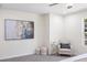 Bedroom offers a serene sitting area and a neutral palette, creating a relaxing ambiance at 1270 Graymont Sw Dr, Atlanta, GA 30310