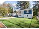 Charming home with fresh green lawn and curb appeal, perfect for a Gathering at 1270 Graymont Sw Dr, Atlanta, GA 30310