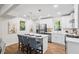 Modern, all-white kitchen with stainless steel appliances and a center island at 1270 Graymont Sw Dr, Atlanta, GA 30310
