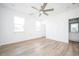 Spacious bedroom with hardwood floors and bathroom access at 1648 Florence Nw Run, Atlanta, GA 30318