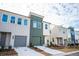 Row of newly constructed townhouses with modern design and curb appeal at 1648 Florence Nw Run, Atlanta, GA 30318