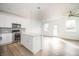 Modern kitchen with stainless appliances, island, and ample counter space at 1648 Florence Nw Run, Atlanta, GA 30318