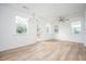 Open concept room with hardwood floors, kitchen, and plenty of natural light at 1648 Florence Nw Run, Atlanta, GA 30318
