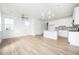 Open concept living room and kitchen with hardwood floors at 1648 Florence Nw Run, Atlanta, GA 30318