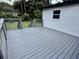 Back deck with gray wood and railing, overlooks lawn at 1937 Don Juan Ln, Decatur, GA 30032
