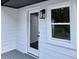 Back door with modern glass and window; updated exterior detail at 1937 Don Juan Ln, Decatur, GA 30032