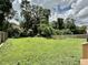 Large, green backyard with privacy fence provides an ideal space for recreation and relaxation at 1937 Don Juan Ln, Decatur, GA 30032