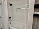 Bathroom showing a tiled shower, modern fixtures, and built-in shelves for storage at 1937 Don Juan Ln, Decatur, GA 30032