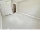 Neutral bedroom featuring plush carpeting and double door closet for ample storage at 1937 Don Juan Ln, Decatur, GA 30032