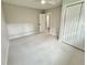 Bright bedroom featuring neutral paint, updated carpet, walk-in closet, and a ceiling fan at 1937 Don Juan Ln, Decatur, GA 30032