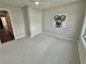 Bright bedroom with fresh neutral paint, plush carpet, closet and a ceiling fan at 1937 Don Juan Ln, Decatur, GA 30032