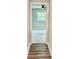 View of a neutrally decorated bedroom through a doorway at 1937 Don Juan Ln, Decatur, GA 30032