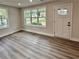 Bright, newly renovated living room showcasing new flooring and natural light at 1937 Don Juan Ln, Decatur, GA 30032