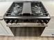 Stainless steel gas range with griddle and oven at 1937 Don Juan Ln, Decatur, GA 30032