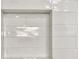 Close-up of a white tiled shower niche, perfect for storing shampoo and soap at 1937 Don Juan Ln, Decatur, GA 30032