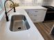 Stylish black faucet and sink with white countertops and backsplash at 1937 Don Juan Ln, Decatur, GA 30032