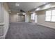 Expansive basement with neutral carpet, recessed lighting, and classic trim at 610 Big Bend Trail, Sugar Hill, GA 30518