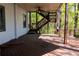 Back deck with stairway leading to green forested backyard at 610 Big Bend Trail, Sugar Hill, GA 30518