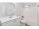 A bathroom featuring a white vanity, toilet, and shower-tub combination at 1528 Wembley Dr, Douglasville, GA 30134