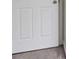 A close-up shot of an interior white door with a carpeted floor at 1528 Wembley Dr, Douglasville, GA 30134
