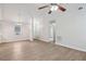 A spacious living room featuring hardwood floors and high ceilings at 1528 Wembley Dr, Douglasville, GA 30134