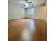 Spacious bedroom with a ceiling fan and a window at 2913 Jordan Forest Trl, Lawrenceville, GA 30044
