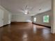 Spacious bonus room with unique flooring, neutral walls, and ample natural light provides versatility at 2913 Jordan Forest Trl, Lawrenceville, GA 30044