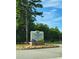 Sweetwater Park sign with the park name and Gwinnett County Parks & Recreation logo on it at 2913 Jordan Forest Trl, Lawrenceville, GA 30044