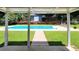 A refreshing in-ground pool sits amidst a lush green lawn, with a shed in the background at 2913 Jordan Forest Trl, Lawrenceville, GA 30044
