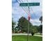 Street corner with street signs, stop sign, and green trees surrounding the area at 2913 Jordan Forest Trl, Lawrenceville, GA 30044