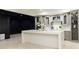 Basement bar with white countertop, gray cabinets, and herringbone flooring at 3258 Bransley Way, Duluth, GA 30097