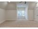 Carpeted bedroom with dormers, neutral paint, and natural light from the window at 3258 Bransley Way, Duluth, GA 30097