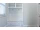 Well-organized mudroom with built-in shelving, storage, and convenient hooks at 3258 Bransley Way, Duluth, GA 30097