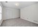 Roomy bedroom with carpet and closet at 334 Bridgewood Se Dr, Conyers, GA 30094