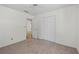 Spacious bedroom with a closet and an open doorway at 334 Bridgewood Se Dr, Conyers, GA 30094