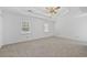 Large main bedroom with carpet, trey ceiling, and natural light at 334 Bridgewood Se Dr, Conyers, GA 30094