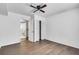 Hardwood floors, ceiling fan, closet and ensuite access in a bright bedroom at 5440 Huron Dr, Lake City, GA 30260
