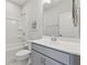 Clean bathroom with shower/tub combo, neutral color scheme and modern fixtures at 3440 Hardy St, Duluth, GA 30096
