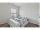 Cozy bedroom featuring plush carpeting, and natural light from the window at 3440 Hardy St, Duluth, GA 30096