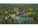 Aerial view of community amenities including tennis courts, a pool, and a golf course at 4634 Whitestone Way, Suwanee, GA 30024