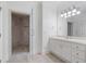 Bathroom boasts a tiled shower and a vanity with drawers and storage at 4634 Whitestone Way, Suwanee, GA 30024