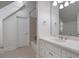 Bathroom features a white vanity and shower/tub combo at 4634 Whitestone Way, Suwanee, GA 30024