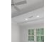 Bedroom with tray ceiling and windows and views to the greenery outside at 4634 Whitestone Way, Suwanee, GA 30024