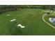 Scenic golf course featuring lush green fairways and manicured sand traps at 4634 Whitestone Way, Suwanee, GA 30024