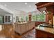Spacious kitchen with a large island, granite countertops, and modern stainless steel appliances at 4634 Whitestone Way, Suwanee, GA 30024