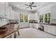 Bright office space with custom built-ins, granite countertops, and views of the lush landscape at 4634 Whitestone Way, Suwanee, GA 30024