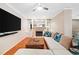 Warm, inviting living room with fireplace, shelving, and a comfortable sectional sofa at 4771 Summerwood Se Dr, Smyrna, GA 30126