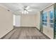 Spacious bedroom features neutral walls, soft carpet, and a ceiling fan at 58 Monet Nw Ct, Atlanta, GA 30327