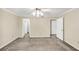 Empty bedroom featuring neutral walls and access to a walk-in closet at 58 Monet Nw Ct, Atlanta, GA 30327