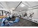 Assorted weight machines and exercise equipment in a bright community gym space at 58 Monet Nw Ct, Atlanta, GA 30327